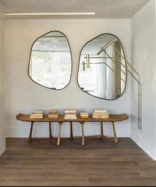 irregular wall mirror in modern living room